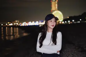 Dreamy Sunset by the Sea: Young Woman Relaxing and Gazing-4