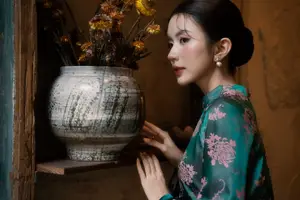 Elegant Asian Beauty: Serene Woman in Modernized Traditional Dress with Vintage Floral Vase-0