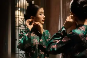 Elegant Asian Beauty: Serene Woman in Modernized Traditional Dress with Vintage Floral Vase-11