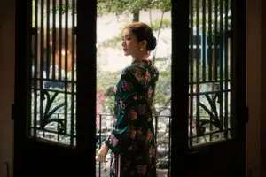 Elegant Asian Beauty: Serene Woman in Modernized Traditional Dress with Vintage Floral Vase-4
