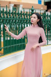 Graceful Vietnamese Woman in Pink Ao Dai: A Stunning Portrayal of Traditional Asian Beauty 1000019457-3