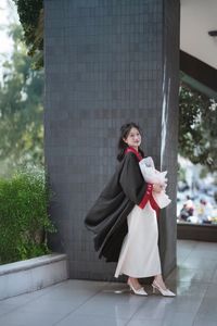 Radiant Student in Graduation Gown Captures Memorable Moment of Success and Joy for a Bright Future.-13