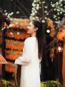 Pure Elegance of White Ao Dai in Traditional Vietnamese Setting-0