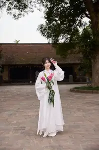 Elegant White Ao Dai with Pink Lotus Flower Embracing Cultural Heritage-5