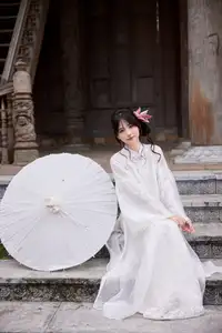 Elegant White Ao Dai with Pink Lotus Flower Embracing Cultural Heritage-7