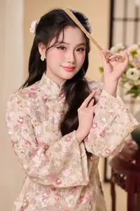Graceful Vietnamese Woman Unveiled: Elegant Modern Ao Dai with Intricate Floral Patterns-14