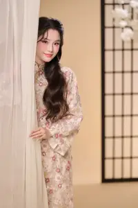 Graceful Vietnamese Woman Unveiled: Elegant Modern Ao Dai with Intricate Floral Patterns-2