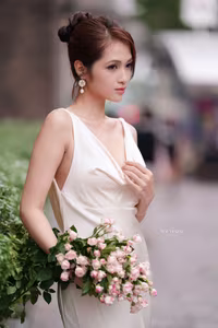 VGU No.11: Elegant Charm: A Woman's Grace in White Gown and Delicate Rose Bouquet-8