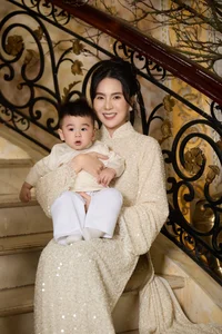Elegant Mother and Son Photoshoot: MC Mai Ngọc Celebrates Vietnamese Tradition in Stunning Red Ao Dai with Her Adorable Baby Boy-0