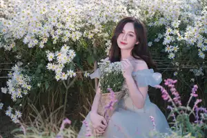 Enchanting Muse in White Chrysanthemum Field: A Portrait of Grace and Natural Beauty.-1