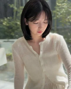 Timeless elegance of classic black bob hair amidst the lush green forest-6