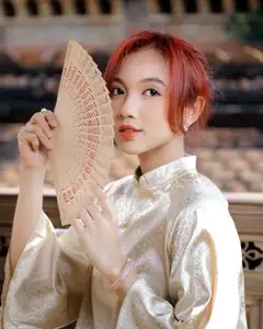 Vietnamese Ao Dai: Graceful Beauty of a Young Woman Amidst Ancient Architecture Under Warm Sunlight-4