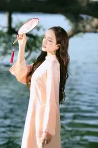 Elegant Vietnamese Beauty in Ao Dai by the Lake  A Glimpse of Hanoi's Serene Charm 1000025296-11