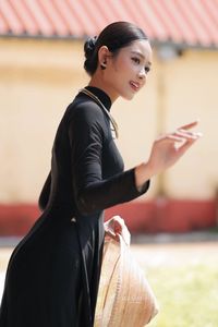 Graceful Vietnamese Woman in Elegant Black Ao Dai-8