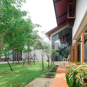 Modern Tropical 2-Story Home Design: The LP16 House Featuring North-South Ventilation, Private Pool, and Sustainable Wooden Louvers for Multi-Generational Living-13