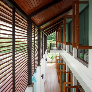 Modern Tropical 2-Story Home Design: The LP16 House Featuring North-South Ventilation, Private Pool, and Sustainable Wooden Louvers for Multi-Generational Living-12