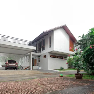 Modern Tropical 2-Story Home Design: The LP16 House Featuring North-South Ventilation, Private Pool, and Sustainable Wooden Louvers for Multi-Generational Living-0