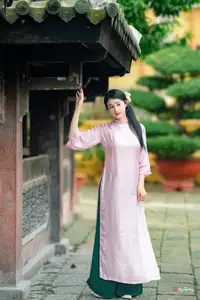 VGU No.163: The Graceful Beauty of a Vietnamese Girl in Traditional Pink Ao Dai Amidst Ancient Architecture-7