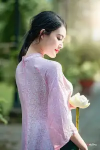 VGU No.163: The Graceful Beauty of a Vietnamese Girl in Traditional Pink Ao Dai Amidst Ancient Architecture-4