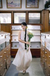 Captivating Asian Beauty: Elegant Young Woman with Braided Hair and Dreamy Gaze - 1000019730-6