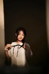 Gentle Beauty of a Young Woman in Golden Light: An Evocative Portrait.-7