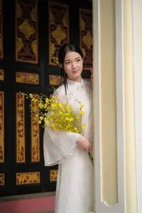 Vietnamese Beauty: Elegant Girl in White Ao Dai, Conical Hat with Yellow Flowers in Ancient Garden-5