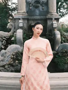 Nguyet Anh in Ao Dai: Volleyball Beauty Queen's Graceful New Year Look-1