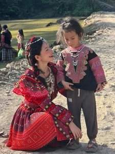 Do Yen Dan Radiates Sophistication in a Stunning Purple Silk Gown-5