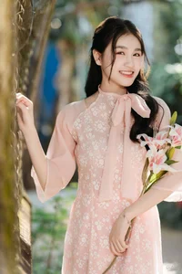Poetic Beauty in Pink Ao Dai and White Lilies-7
