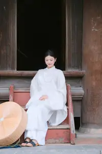 Pure Beauty: Girl in White with Orchids - Grace and Serenity of East Asian Charm-7