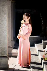 Captivating Serenity: Vietnamese Girl in Pink Ao Dai with Lotus Flowers1730591-31