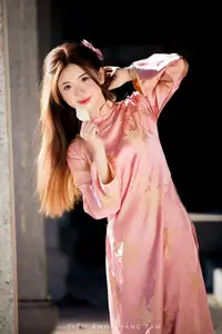 Captivating Serenity: Vietnamese Girl in Pink Ao Dai with Lotus Flowers1730591-24
