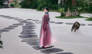 Graceful East Asian Beauty: Traditional Charm in a Lush Green Garden-16