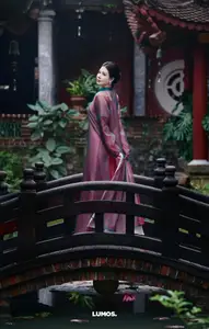 Graceful East Asian Beauty: Traditional Charm in a Lush Green Garden-14