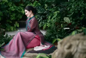 Graceful East Asian Beauty: Traditional Charm in a Lush Green Garden-10