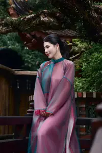 Graceful East Asian Beauty: Traditional Charm in a Lush Green Garden-8