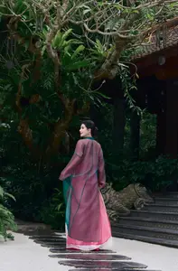 Graceful East Asian Beauty: Traditional Charm in a Lush Green Garden-9