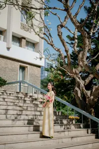 Serene Vietnamese Beauty in Ao Dai with Lilies: A Moment of Grace and Tranquility-8
