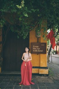 Vietnamese Woman's Beauty Amidst Hoi An Ancient Town, by Iconic Japanese Covered Bridge-1