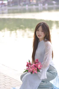 Elegant Traditional Ao Dai at Hoan Kiem Lake: A Timeless Fashion Journey Through the Heart of Hanoi, Vietnam-0