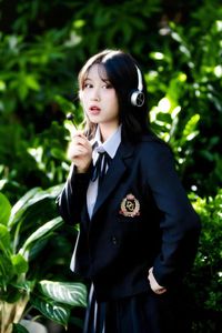 Discover the captivating smile of an Asian girl amidst vibrant nature-7