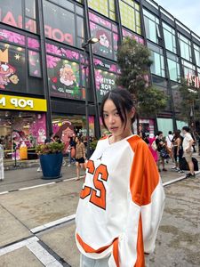 Miss Thanh Thuy's Dynamic Gen Z Style in Thailand: Chic Polo Dress Street Style-3