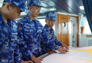Dedicated Naval Officers Guarding Serene Coastal Waters During Spring: A Tribute to Maritime Duty and Breathtaking Ocean Landscapes-7