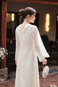 Elegant Vietnamese Muse: Graceful Modern Ao Dai in a Serene Setting-4
