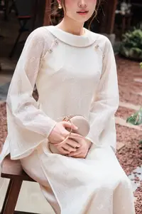 Elegant Vietnamese Muse: Graceful Modern Ao Dai in a Serene Setting-5