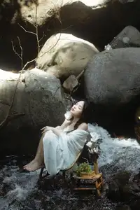 Serene Asian Beauty: A Delicate Moment with a White Flower-3