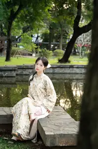 East Asian Traditional Beauty: Gentle Young Woman in Ao Dai with Elegant Wooden Fan-3