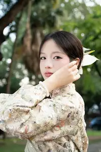 East Asian Traditional Beauty: Gentle Young Woman in Ao Dai with Elegant Wooden Fan-17