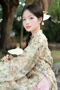 East Asian Traditional Beauty: Gentle Young Woman in Ao Dai with Elegant Wooden Fan-15
