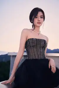 Rooftop Glamour: Elegant Woman Shines in Chic Black Dress, Captivating All Eyes with Effortless Style.-5